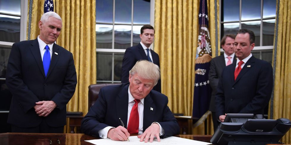 Trump signs first executive order